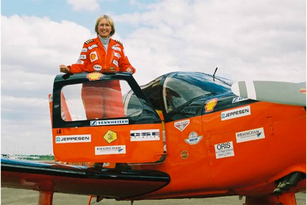 polly vacher famous female pilot orange plane