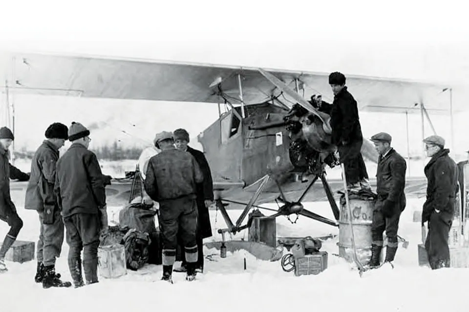 wien family famous alaskan pilots working on plane